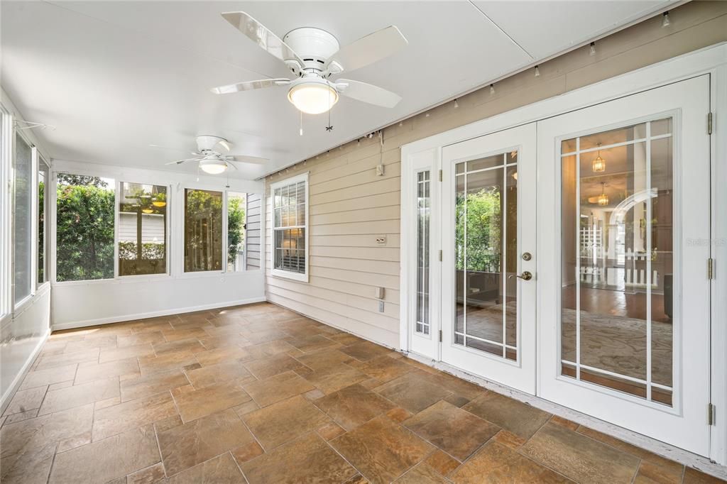 With vinyl windows & doors and insulated ceiling the lanai can function as a screen porch in the summer and a Florida room in the winter months