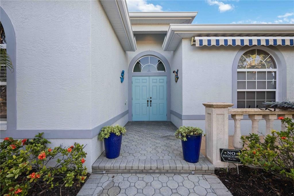 Paved walkway to courtyard entrance.