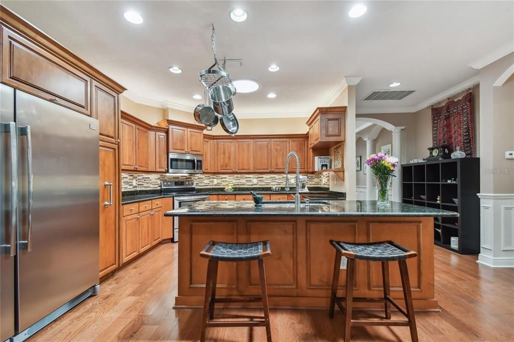 Kitchen with island bar seating