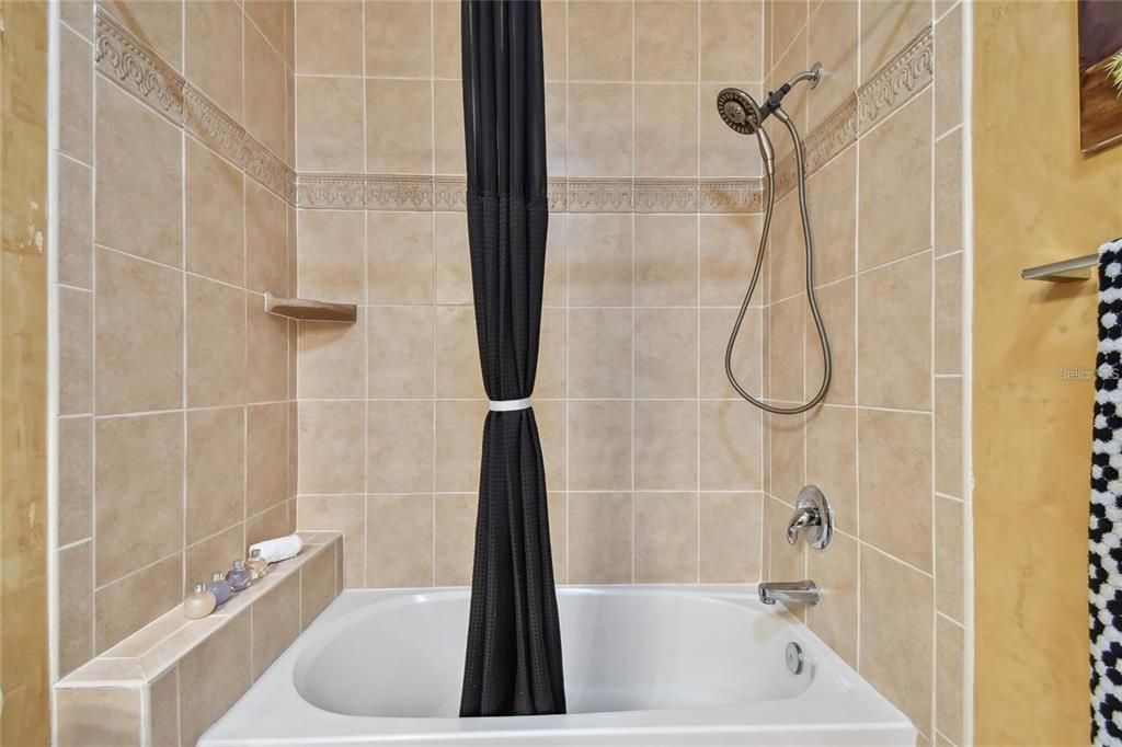 Soaking tub / shower combo in hall bath