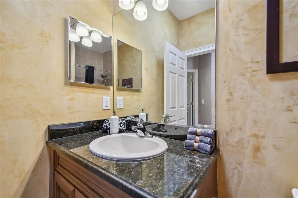 Single sink vanity in hall bath