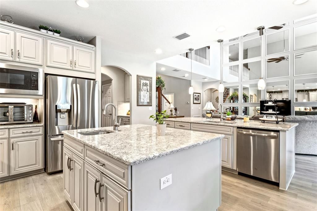 This kitchen separates the living area space nicely while still maintaining a connected feel.