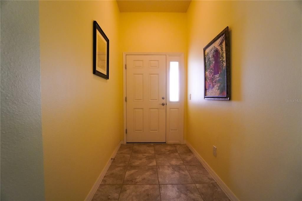 Foyer with tile