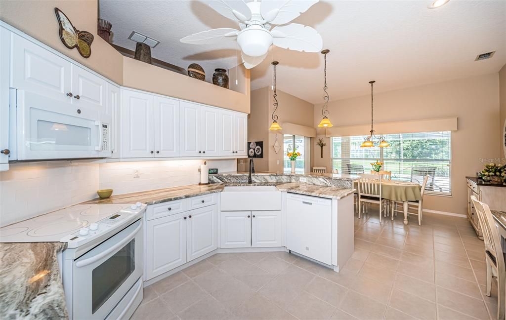 Light bright remodeled kitchen, ceramic tile floors