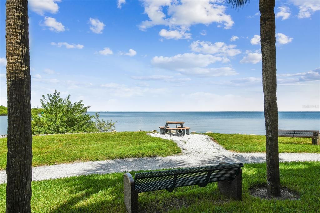 walking path all the way around the property with picnic tables and benches