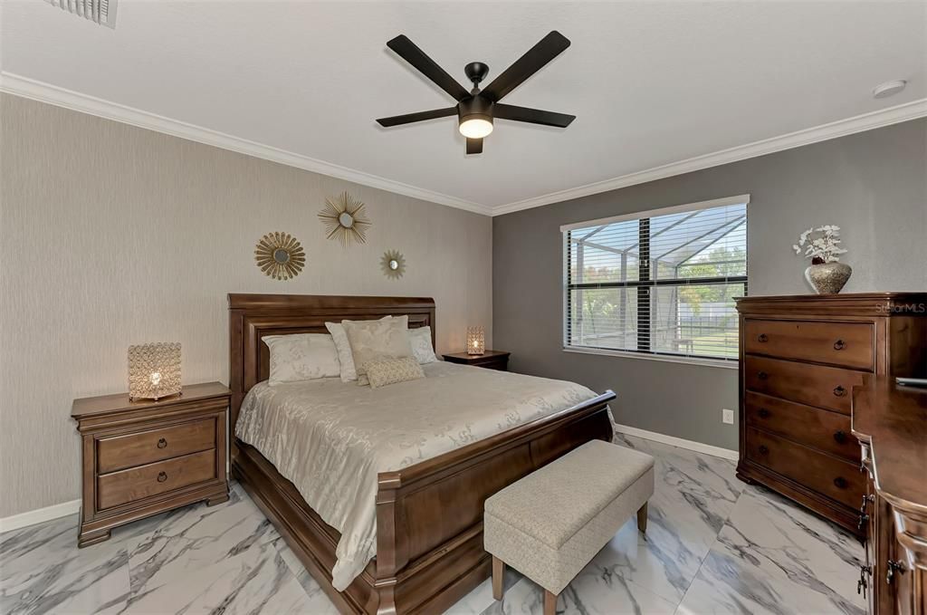 Primary bedroom. Please note the wallpaper, accent wall.