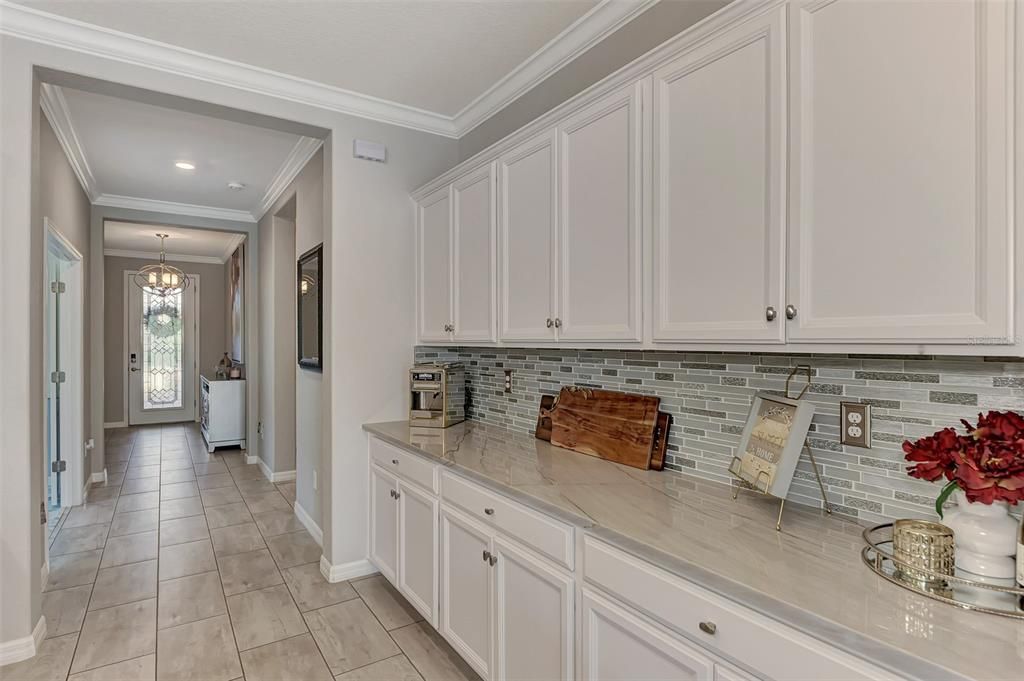 Plenty of counter space and cabinets for entertaining !