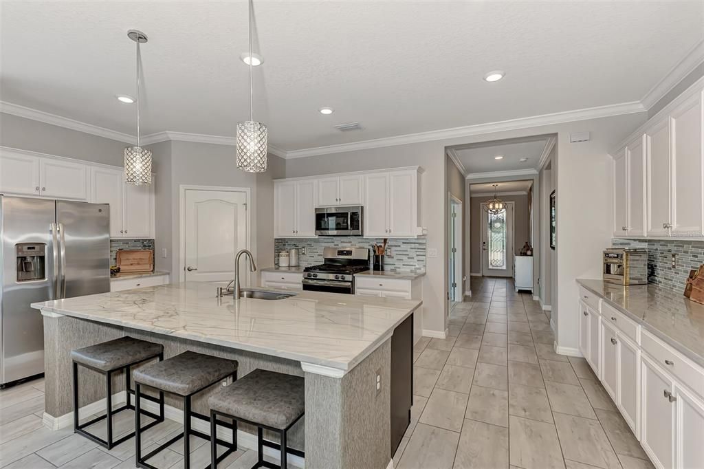 This kitchen is perfect for those who love to cook and entertain!