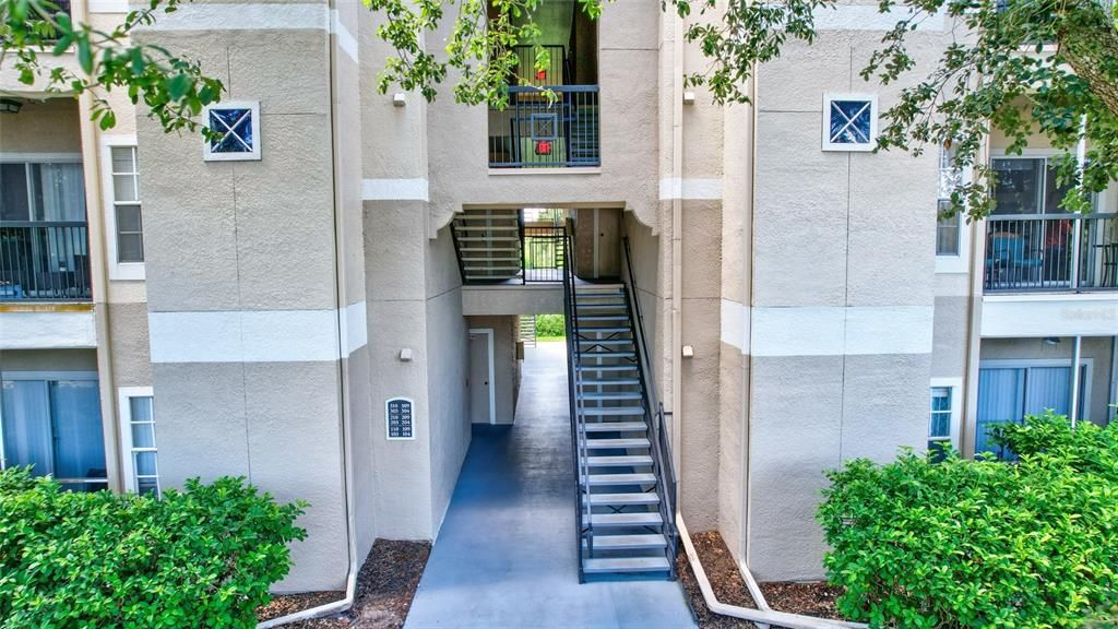 Stairs up to Unit 303  on 3rd floor