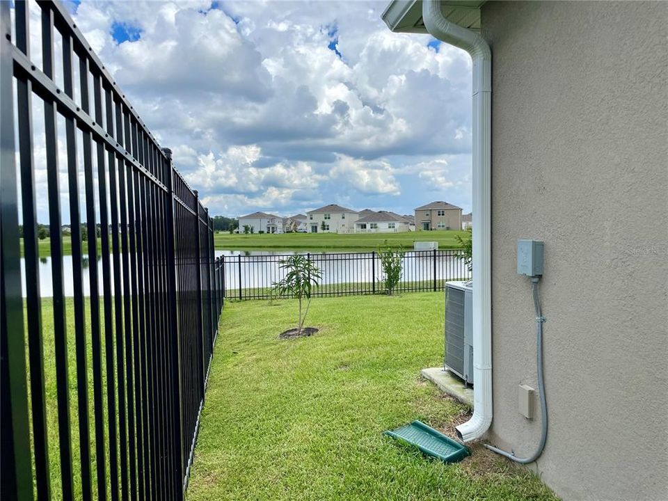 Left side view of side yard fully fenced