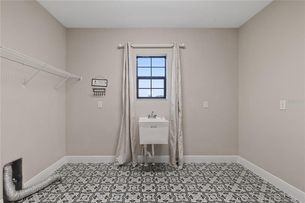 Spacious Laundry Room with wash tub