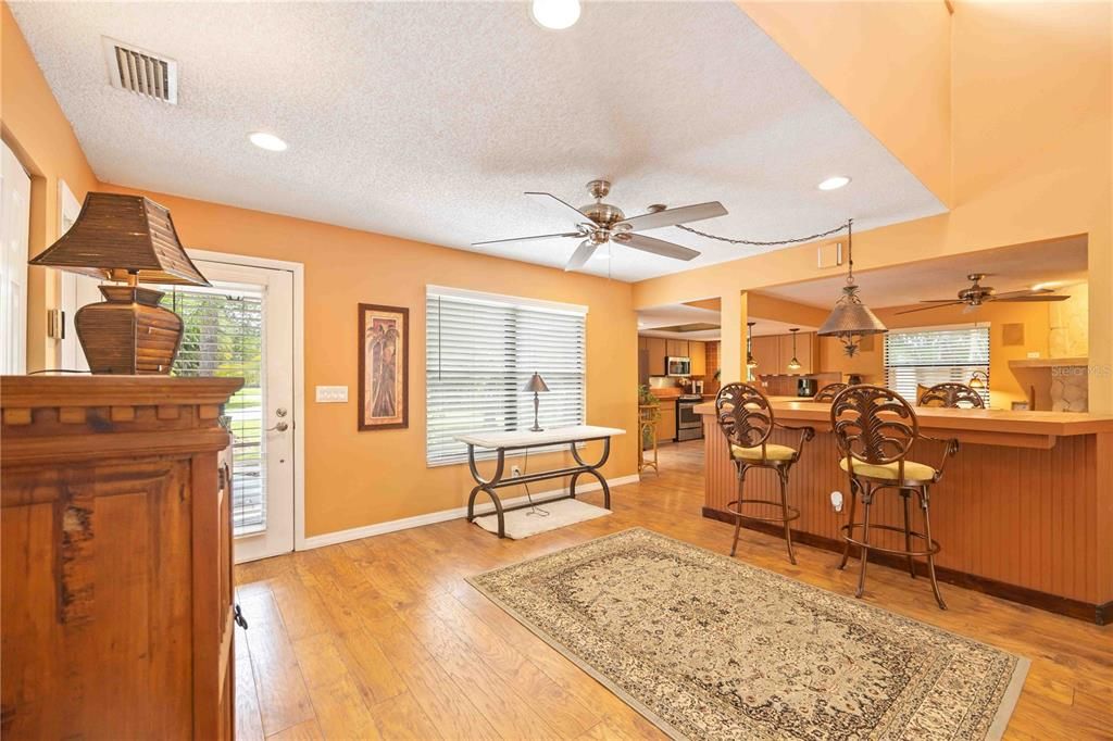 Front door to the left-looking into the Living Area and Breakfast Bar