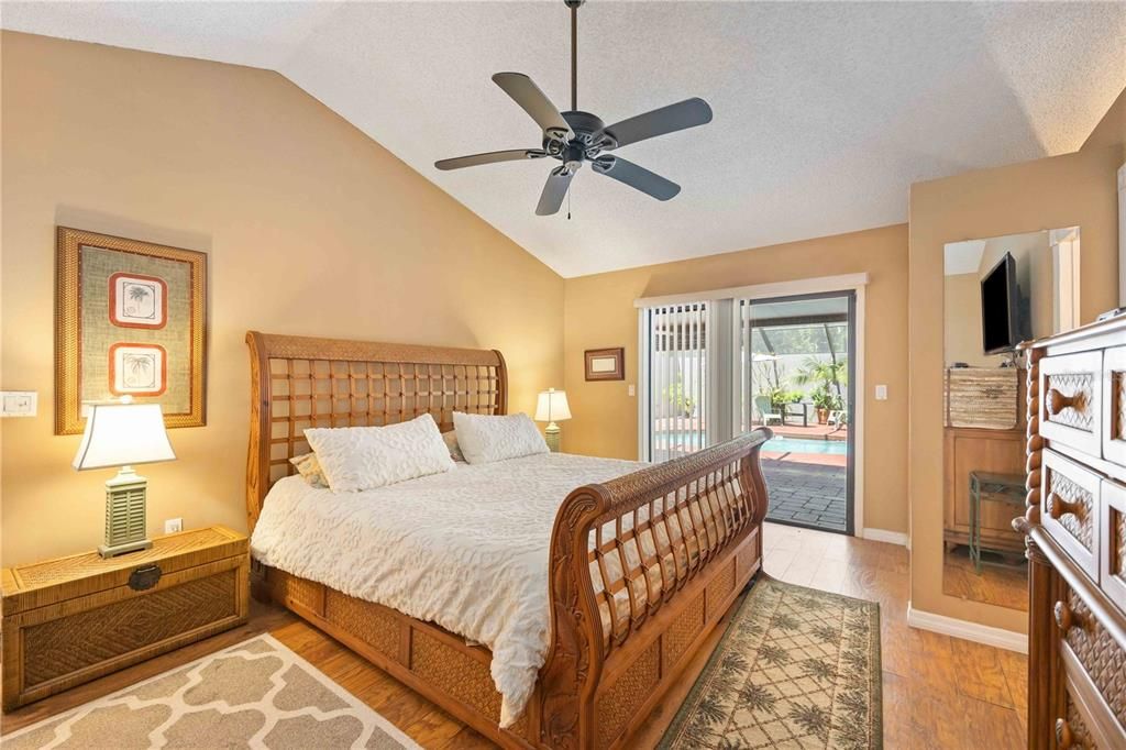 Primary Bedroom with access to the pool & lanai