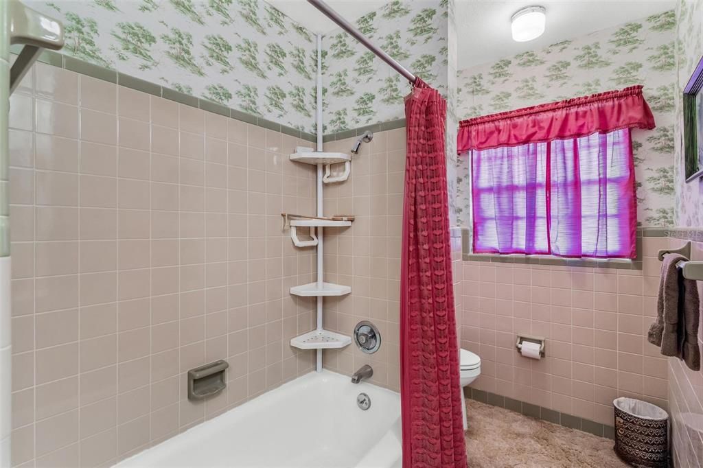 Guest Bath with Tub and Shower Combo and Private Water Closet