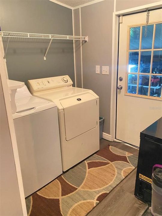 Laundry room off of dining area and seperate door to workshop