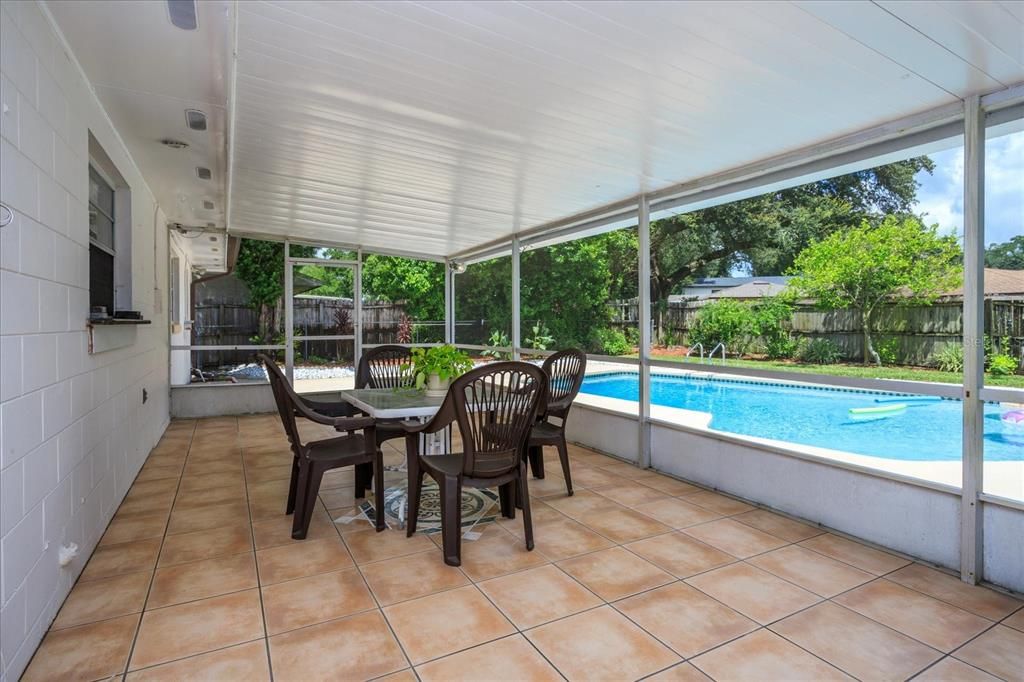 Back porch overlooking the sparkling pool