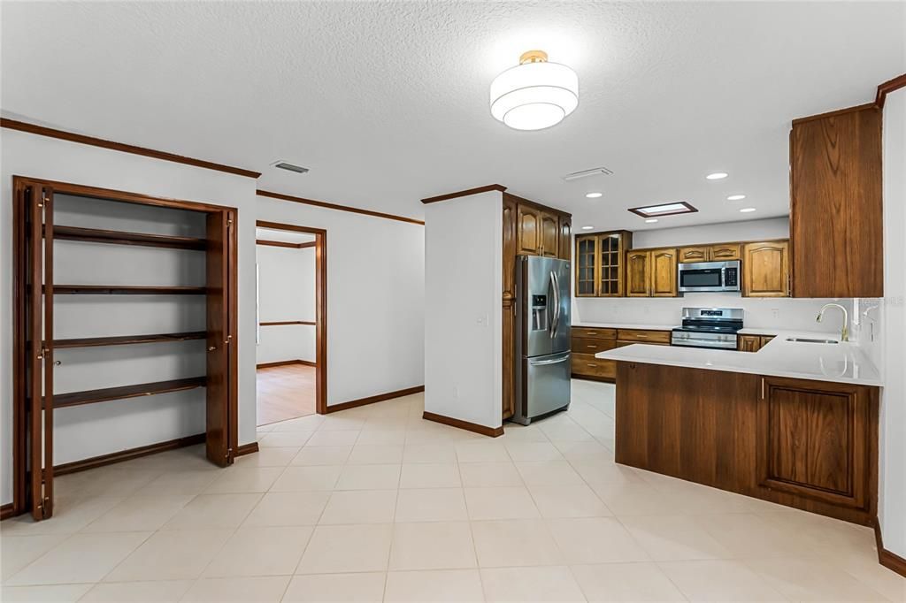 Large pantry and stainless appliances