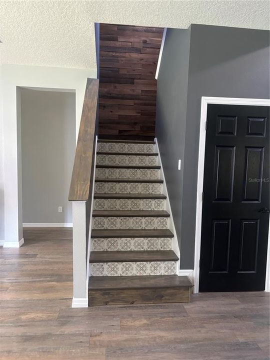 Stunning new stair treads and tiled risers!