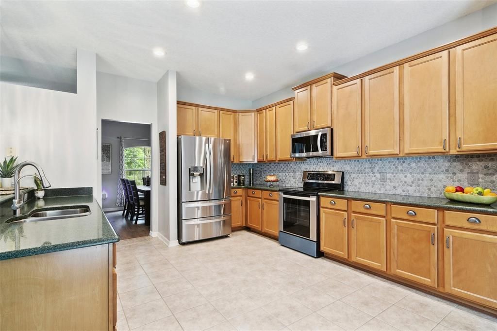 Tons of counter space! All new cabinet hardware and backsplash.