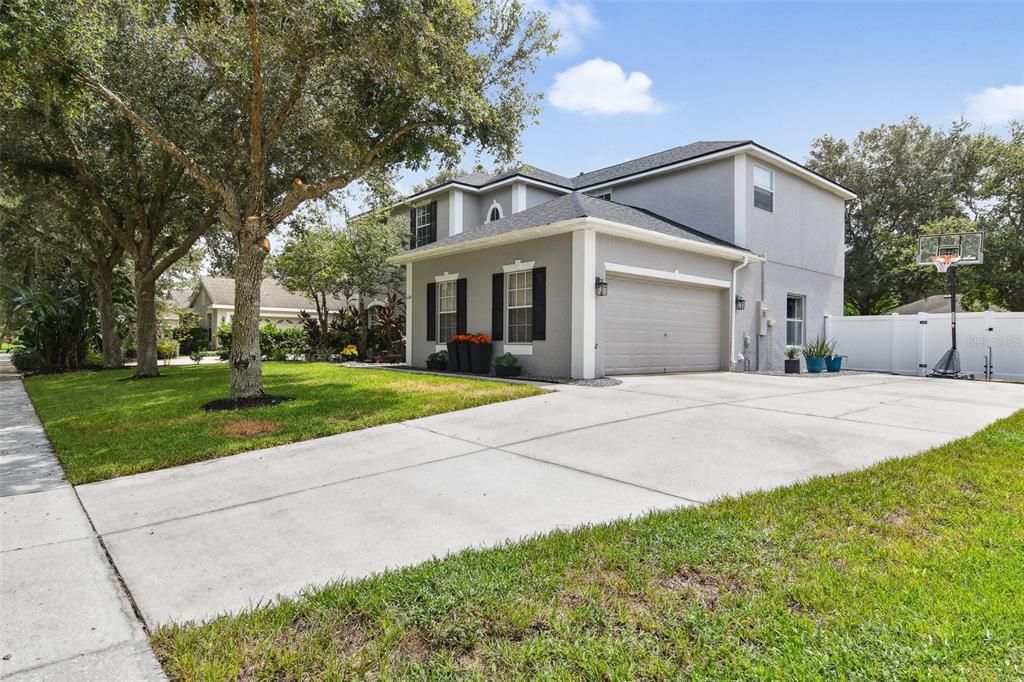 Side facing Garage with long driveway.