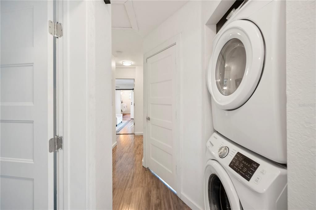 Laundry closet off the bedroom hallway