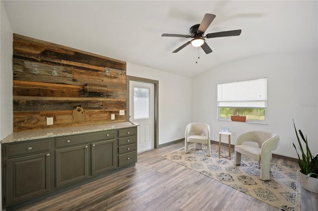 Bonus room! Attached to the garage and off the patio with a mini-split AC!