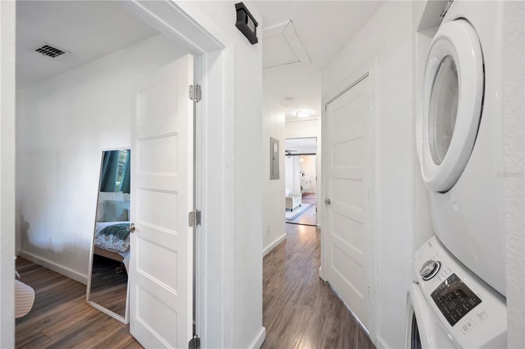 Laundry closet off the bedroom hallway