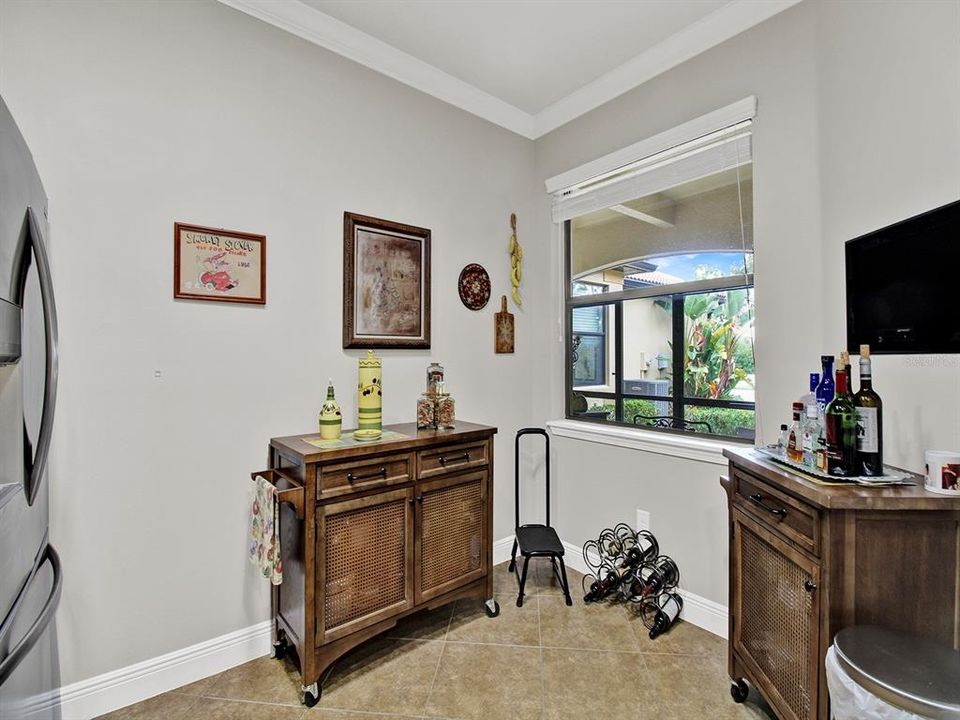 Eat in area in kitchen. Extra storage cabinets can stay with property!