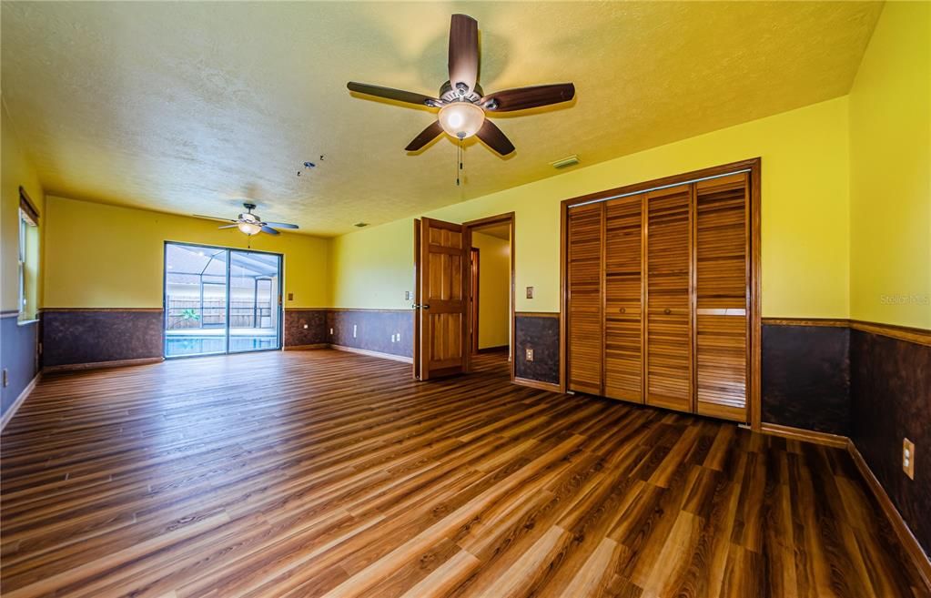 Third bedroom/game room with view to the lake and pool