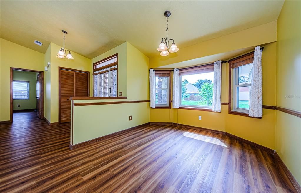 Dining room with view to front door and master bedroom