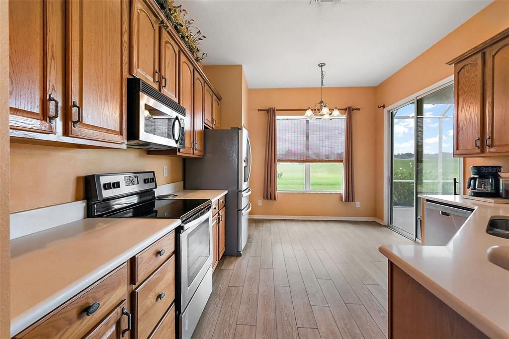 Large eat in kitchen w/Luxury vinyl plank flooring