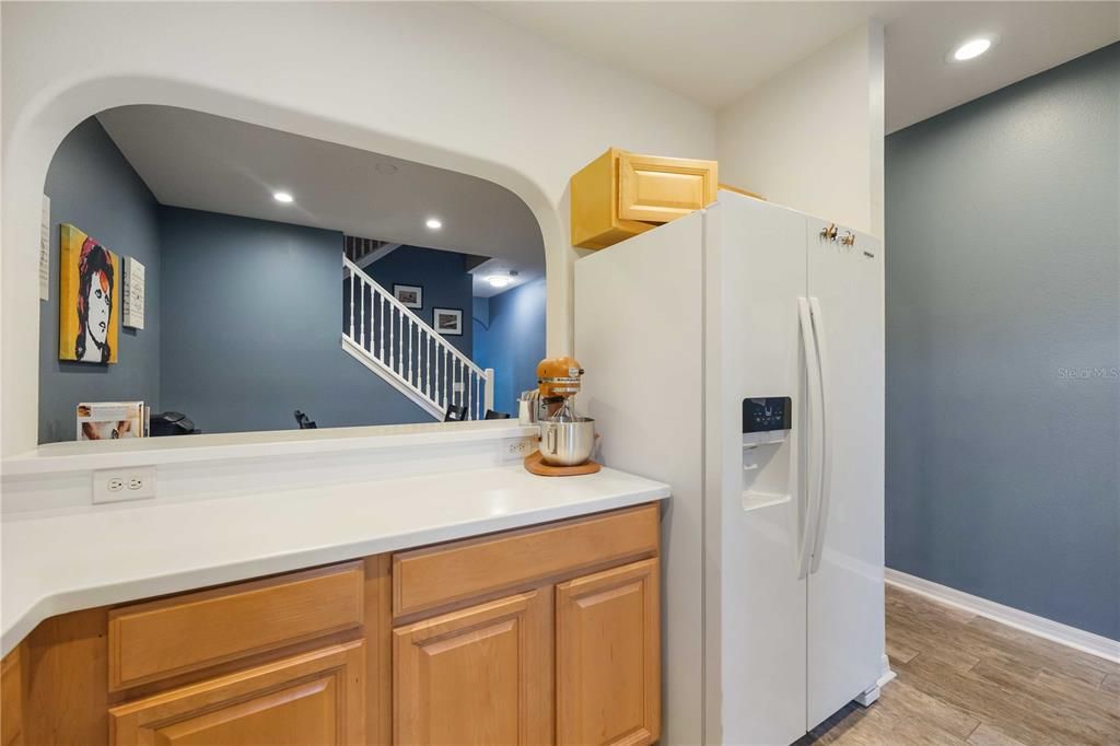 Kitchen with pass-through window to dining room