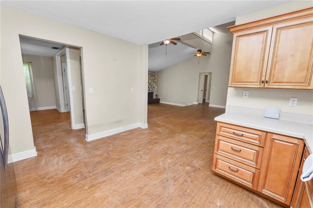 Kitchen looking into dining room on the left and living room on the right