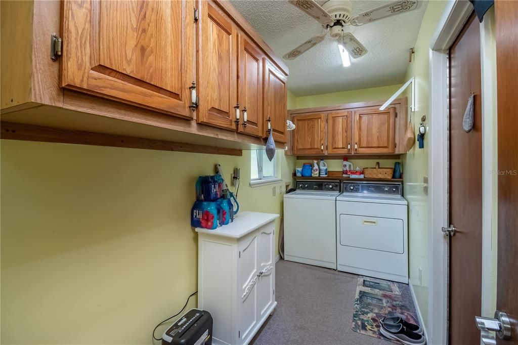 Inside Laundry/ Utility Room with plenty of Pantry Space