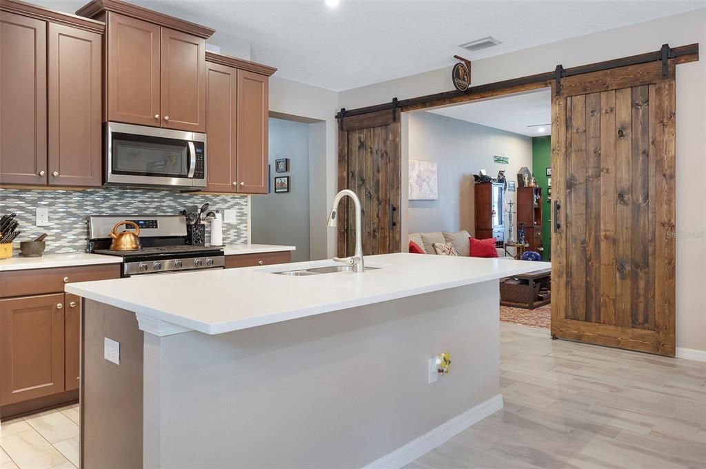 Kitchen looking into Bonus Room