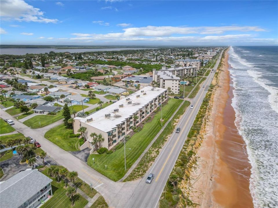 Aerial View of Building with Beach