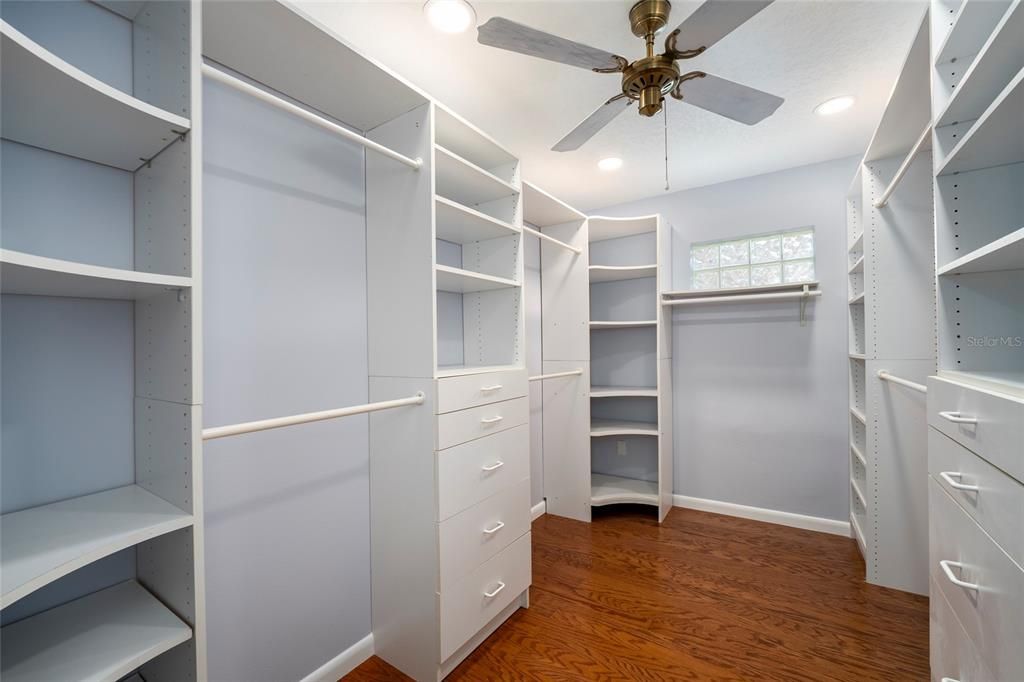 This Master Walk-In Closet is so large, it could almost be another bedroom! Imagine replacing the fan with a stunning chandalier.