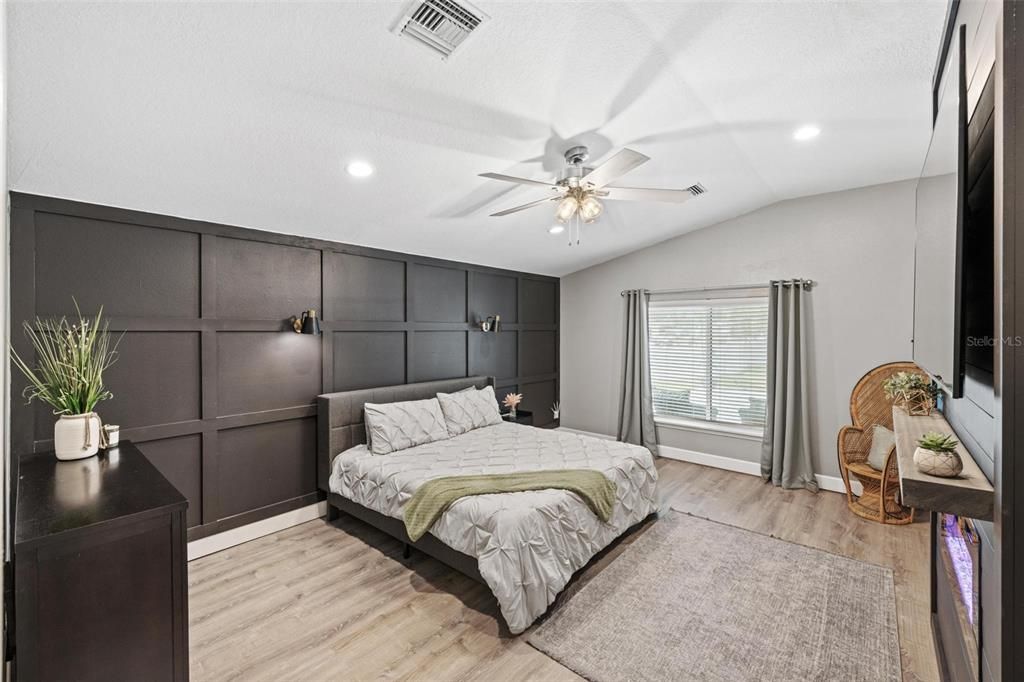 Primary Bedroom with Custom Wood Wall