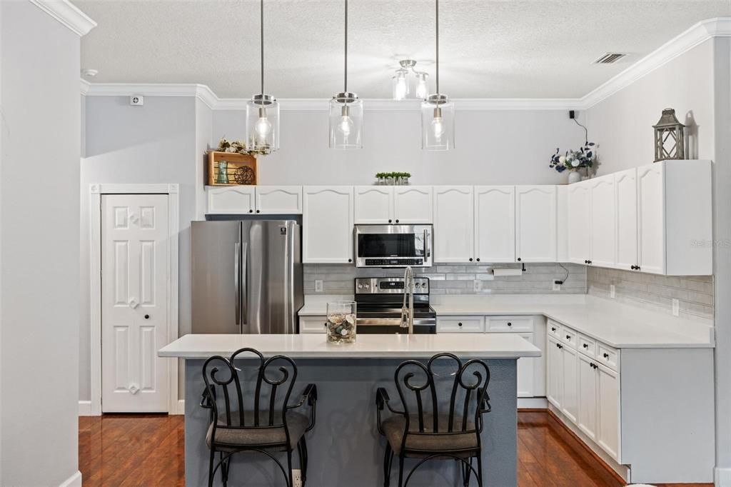 Kitchen with Stainless Appliances & Quartz Counters