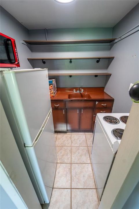 KITCHENETTE IN PRIMARY SUITE ~ CAN BE CONVERTED BACK INTO WALK IN CLOSET