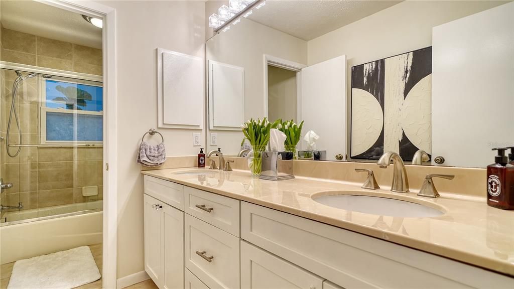 Full bathroom between the two spare bedrooms.