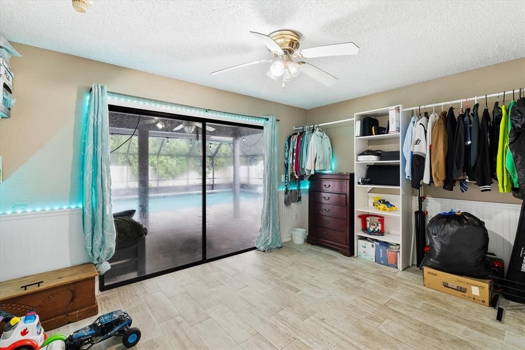 Staged photo of the dressing area/bonus space off of the primary bedroom suite.