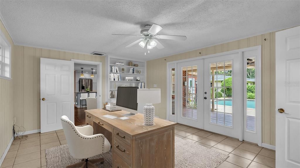 Bonus room with private bath and French doors to pool.  Virtually Staged.