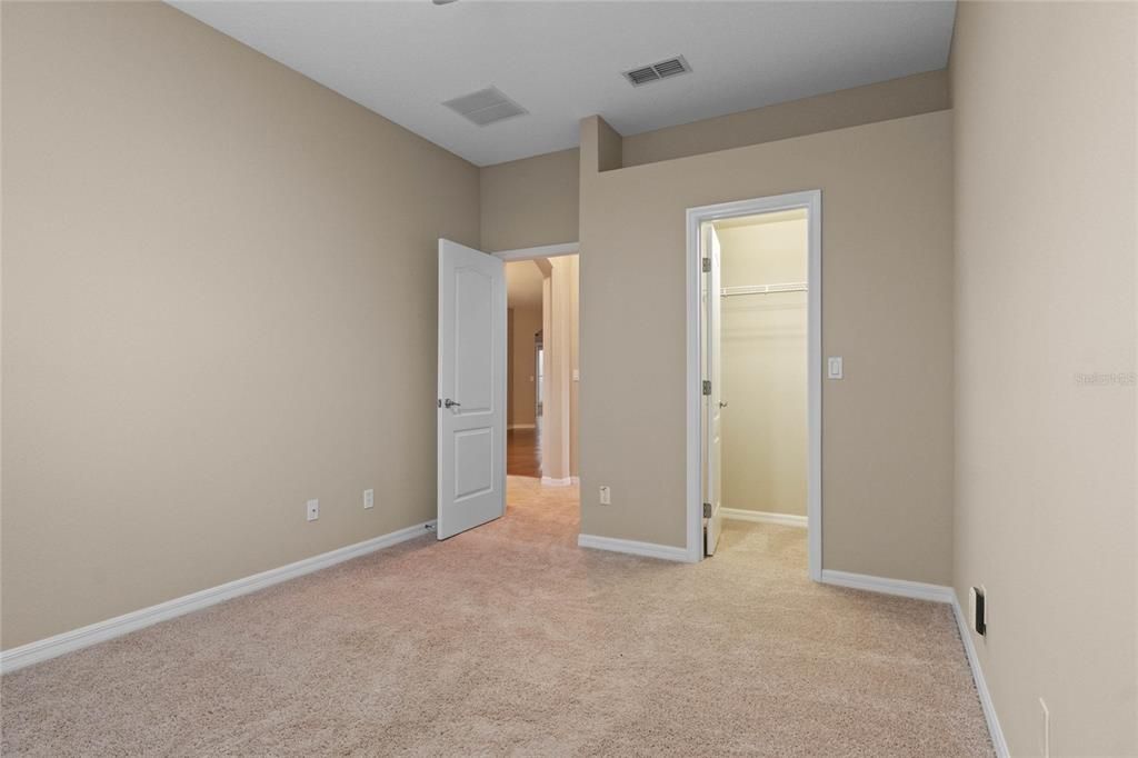 Bedroom 2 with Walk-In closet and new carpet