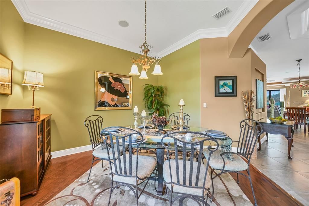 dining area with wood flooring