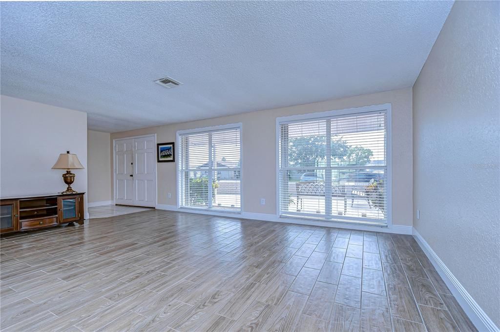 Natural light floods the living and dining room.