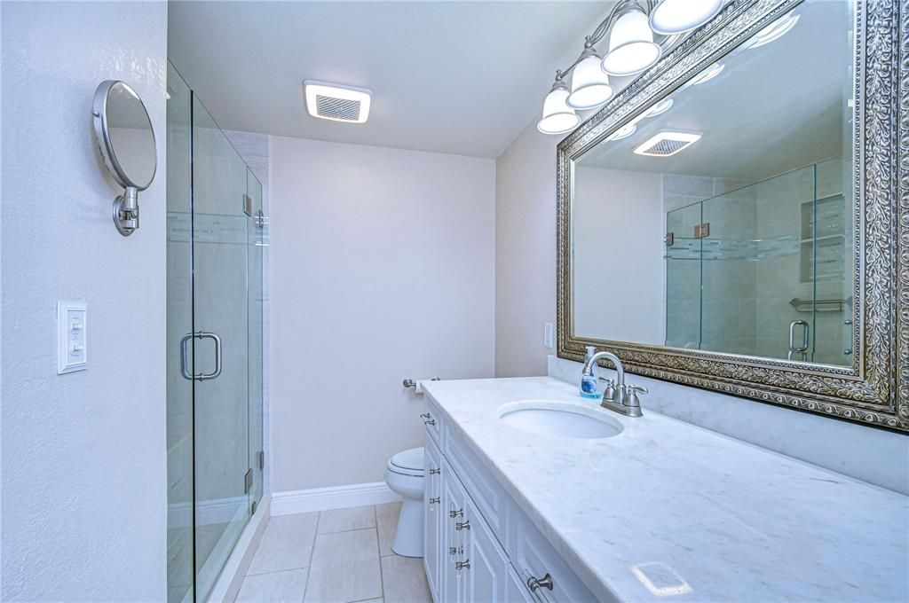 The primary en-suite bath is updated and beautiful!