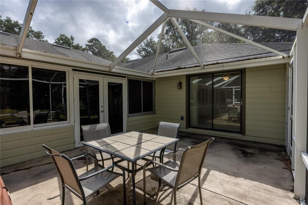 Screened Porch and doors to Bedroom 3