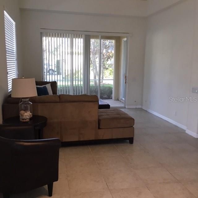 Living room to screened in Porch / Lanai