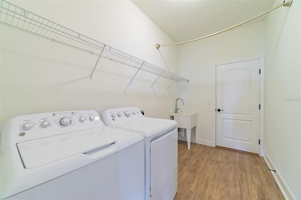 huge laundry room w/ utility sink